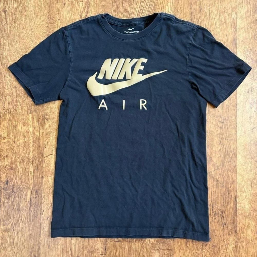 87. super faded black Nike Air tee with warped gold swoosh
